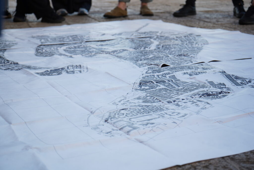 Una imagen de Arquitectura UDD de un plano de la ciudad como forma de representación del territorio